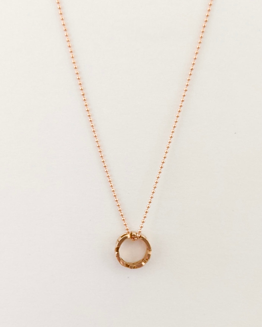 Reminder charm necklace in pink gold