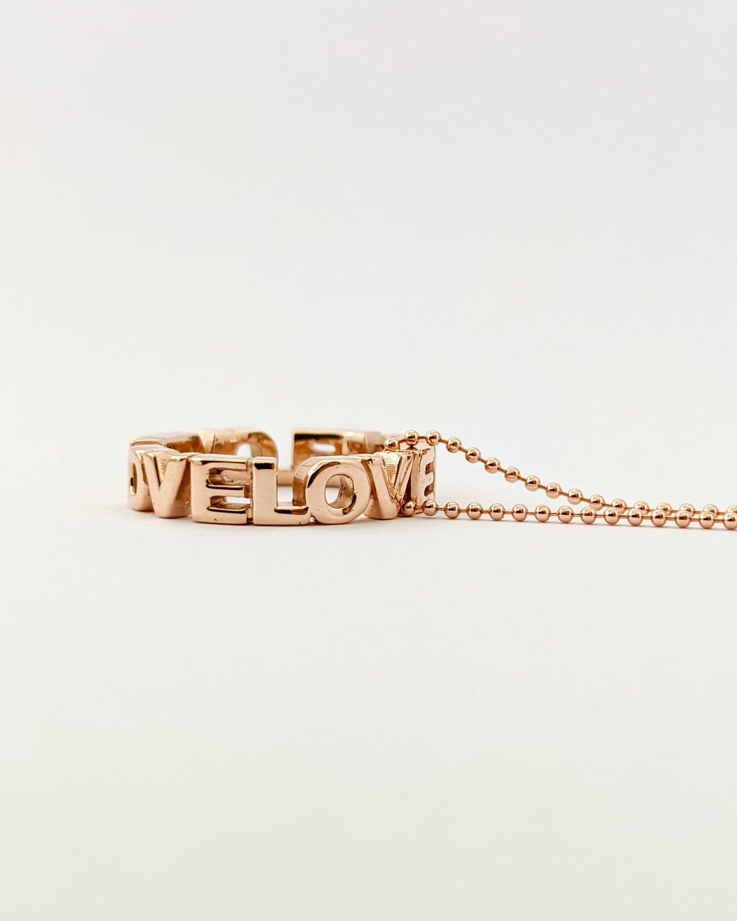 LOVE necklace in 14k pink gold